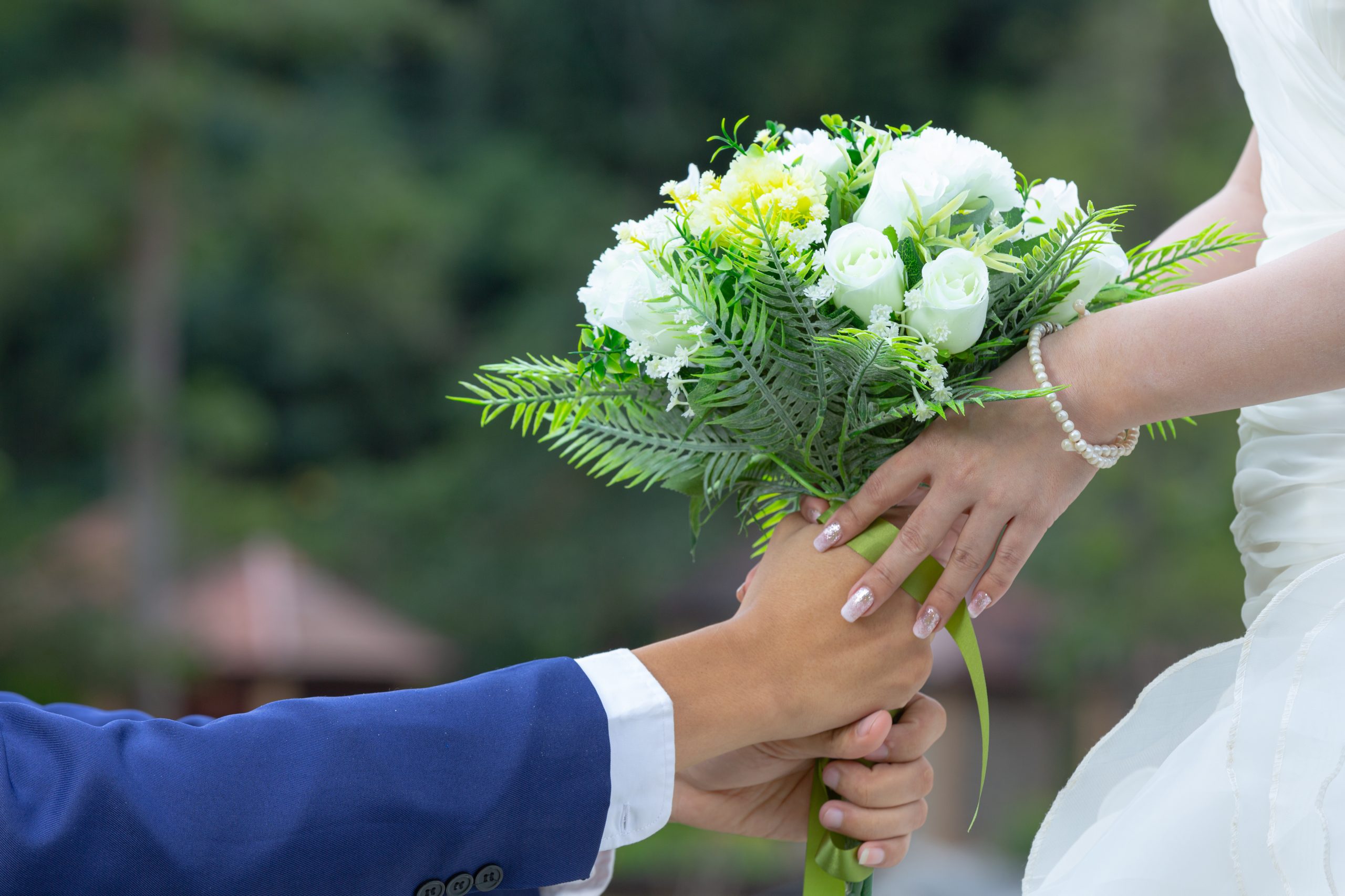 bouquet in the hands of the bride